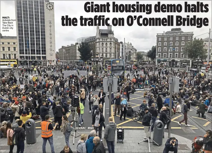  ??  ?? halt: Activists from Take Back The City in Dublin city centre