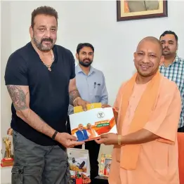  ?? — PTI ?? Actor Sanjay Dutt meets Uttar Pradesh chief minister Yogi Adityanath at his residence in Lucknow on Saturday.