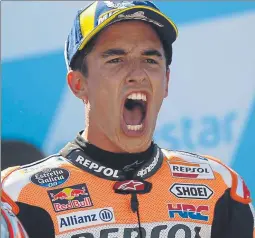  ?? FOTO: AP ?? Marc Márquez Desata su euforia en el podio tras su sexta victoria del año