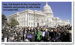  ??  ?? Rep. Ted Deutch (D-Fla.) is joined by students and parents at rally Friday on Capitol Hill.