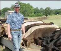  ??  ?? Shawn Boxnick of London has been farming all his life. He raises 50 head of commercial-bred cattle and hay on his farm and also sells wheat straw and alfalfa.