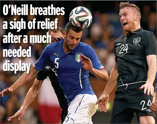  ??  ?? CLEARANCE: Italy’s Thiago Motta and Alex Pearce and, below, Keane with O’Neill
