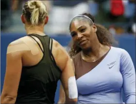  ?? ADAM HUNGER — THE ASSOCIATED PRESS ?? Kaia Kanepi, of Estonia, left, congratula­tes Serena Williams after their fourth round of the U.S. Open tennis tournament, Sunday in New York.