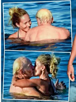  ??  ?? Smooch: Miss Masi is all smiles before the couple cosy up to share a kiss in the water