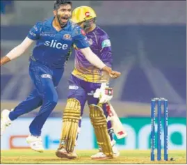  ?? PTI ?? Jasprit Bumrah of Mumbai Indians celebratin­g the wicket of Sunil Narine of Kolkata Knight Riders, during a match at DY Patil Stadium in Mumbai on Monday.