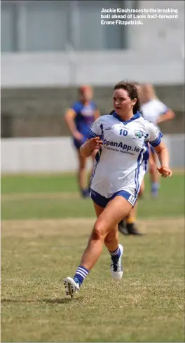  ??  ?? Jackie Kinch races to the breaking ball ahead of Laois half-forward Erone Fitzpatric­k.