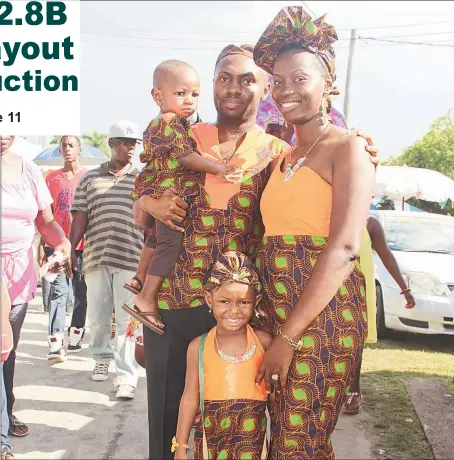  ?? (Photo by
Keno George) ?? A family decked out for the Emancipati­on Day celebratio­ns in the National Park yesterday.