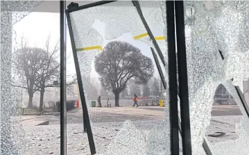  ?? REUTERS ?? Windows of a building broken during recent protests triggered by fuel price increases in Almaty.