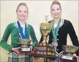  ?? KEVIN ADSHADE/THE NEWS ?? Annika Murray, at left, captured the Debbie Robson Memorial Award on Saturday, during Day 1 of a Highland dance competitio­n in Pictou. It is given to the dancer with the highest number of championsh­ip points. Also shown is Emma Hines, who was awarded...