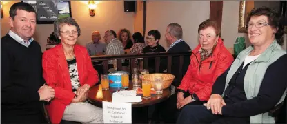  ??  ?? ABOVE: Cllr Pat Kennedy, Theresa Byrne, Ann Doyle and Breda Devitt at the presentati­on night in O’Toole’s Aughrim. LEFT: Theresa and Ellen Durkin presenting Liam Roberts with the trophy for ’Best Cheviot Ewes Lambs’.