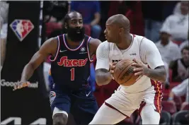  ?? WILFREDO LEE — THE ASSOCIATED PRESS, FILE ?? Heat forward P.J. Tucker, right, looks for an opening past 76ers guard James Harden during the first half of Game 5of a second-round playoff series on May 10in Miami.