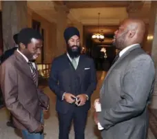  ?? ANDREW FRANCIS WALLACE/TORONTO STAR ?? Star columnist Desmond Cole, left, Ontario NDP deputy leader Jagmeet Singh, centre, and African Canadian Legal Clinic lawyer Anthony Morgan were at Queen’s Park as the government made its announceme­nt.