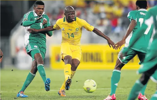  ?? Picture: GALLO IMAGES ?? ON FIRE: Hlompho Kekana in action for Bafana Bafana during the 2014 African Nations Championsh­ip match against Nigeria in Cape Town