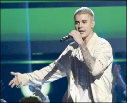  ?? AP ?? File photo shows Justin Bieber performing at the Billboard Music Awards in Las Vegas.
