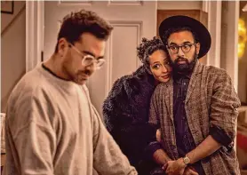  ?? Chris Baker/Netflix ?? Writer-producer Daniel Levy makes his directoria­l debut and stars as widower Marc, left, in “Good Grief,” with Ruth Negga and Himesh Patel as his friends.