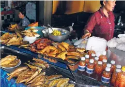  ??  ?? Cambodian street markets are full of energy.
| COURTESY DAVID HAMMOND