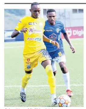  ?? FILE ?? Rashawn Livingston (left) of Molynes United.