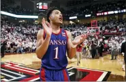  ?? BRAD TOLLEFSON — THE ASSOCIATED PRESS ?? Kansas’ Devon Dotson (1) celebrates after an NCAA college basketball game against Texas Tech on Saturday in Lubbock, Texas.