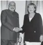  ?? — PTI ?? Prime Minister Narendra Modi meets German Chancellor Angela Merkel in Brisbane.