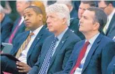  ?? BOB BROWN/RICHMOND TIMES-DISPATCH ?? From left, Lt. Governor-elect Justin Fairfax, Attorney General-elect Mark Herring and Governor-elect Ralph Northam listen to an address at the Pocahontas Building in Richmond, Va., in December.