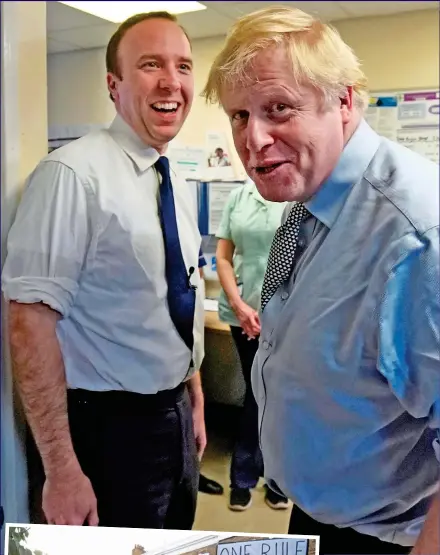  ?? ?? BRAVE FACE: Boris Johnson and Hancock visit a hospital