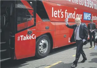  ?? PICTURE: CHRISTOPHE­R FURLONG/GETTY IMAGES ?? Boris Johnson boards the notorious Vote Leave Brexit campaign bus in May 2016