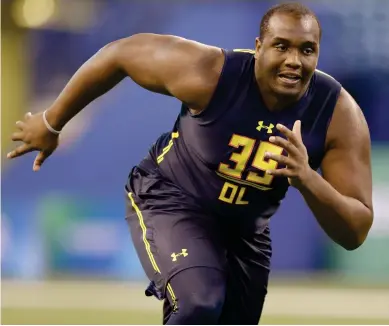  ?? (Photo by Michael Conroy, AP) ?? Justin Senior runs a drill at the NFL scouting combine in March.