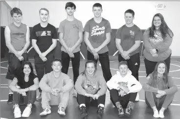  ?? Callaway Courier ?? The 2020-2021 South Loup Wrestling Team from Bottom Row Left are: Student Manager Sharon Jones, Dawson Doggett, Lila Bloomer, Logan Peterson, and Student Manager Devin Peterson; Back Row: Carson Mason, Colby Streit, Talon Crago, Rio Remund,Clay Witthuhn, and Studnent Manager Macy Ryneareson. Not pictured: Dylan Handley.