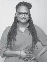  ?? Associated Press ?? ■ Director Ava DuVernay poses for a portrait to promote her film, "A Wrinkle in Time." The film opens today.