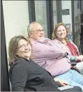  ?? / Kevin Myrick ?? Commission­er Jennifer Hulsey (front) and soon to be Commission­er Ray Carter sat with family and friends waiting for election results on Tuesday night, Nov. 6 after polls closed in the 2018 Midterms.