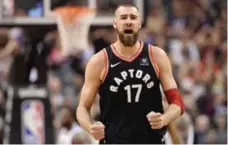  ?? FRANK GUNN/THE CANADIAN PRESS ?? Jonas Valanciuna­s is playing with a confidence that comes with knowing he can shut down the likes of Spurs big man LaMarcus Aldridge.