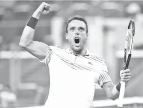  ??  ?? Spain’s Roberto Bautista Agut of Spain celebrates his upset win over world number one Novak Djokovic in the fourth round of the ATP and WTA Miami Open. - AFP photo