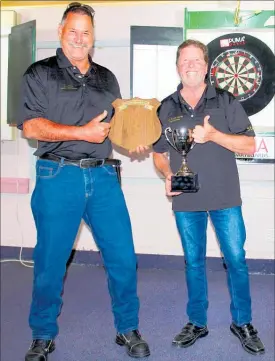  ?? PICTURE / SUPPLIED ?? Far North team captains Robert Bradley and Steve Doak celebrate after beating their counterpar­ts from Whangarei in the annual Challenge Shield darts tournament at Awanui on Sunday.