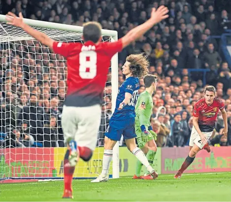  ?? Picture: Getty. ?? Juan Mata (8) celebrates after Ander Herrera, right, scores Manchester United’s first goal.