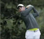  ?? MATT SLOCUM — THE ASSOCIATED PRESS ?? Rory McIlroy of Northern Ireland, hits a drive on the 15th hole during a practice round for the Masters Wednesday in Augusta, Ga.