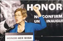  ?? Cliff Owen Associated Press ?? SEN. ELIZABETH WARREN ( D- Mass.), shown speaking last month, is accusing the entertainm­ent giant of “hanging its front- line workers out to dry.”