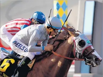  ?? John Gastaldo San Diego Union-Tribune ?? VICTOR ESPINOZA GUIDES California Chrome to a narrow victory over Gary Stevens and Dortmund in the San Diego Handicap at Del Mar. The two horses figure to meet again in the Pacific Classic on Aug. 20.