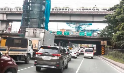  ??  ?? Light at tunnel’s end Main roads of Metro Manila will soon have multi-level roadways, which, along with the extended mass transit systems, hope to end the daily vehicle traffic ordeal of Filipinos.