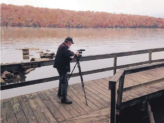  ??  ?? Producer Ned Judge filming at the Lake of the Ozarks in Missouri. COURTESY OF PROJECT ECHO