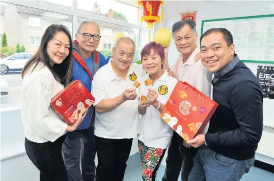  ??  ?? Getting ready Renee Chan, Alexander Chan, Ian Chan, Maria Chan, Peter Wong and Andy Chan are all set for the mooncake festival