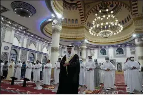  ?? (AP/Kamran Jebreili) ?? The Absentee Prayer is performed Friday in Dubai, United Arab Emirates, after the death of Emirati President Sheikh Khalifa bin Zayed Al Nahyan.