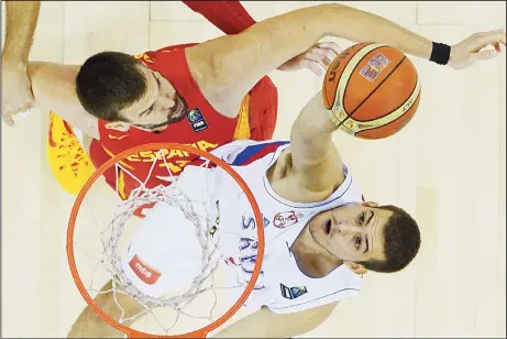 Serbia opens FIBA World Cup play with rout of Angola; Rubio leads