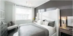  ??  ?? A show home bedroom of the Lanstone Homes developmen­t. Four floor plans feature a master bedroom on the main floor.