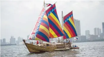 ?? — AFP ?? A traditiona­l Philippine wooden boat known as ‘balangay’ sets sail from Manila to China on Saturday.