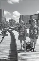  ??  ?? Camp Gan Israel campers Ember and Lolli enjoy Scissortai­l Park in downtown Oklahoma City as part of a camp outing hosted by Chabad Community Center for Jewish Life and Learning.