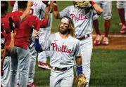  ?? MANUEL BALCE CENETA / ASSOCIATED PRESS ?? Phillies have a chance to end their postseason drought with a bolstered bullpen and strong lineup that includes Bryce Harper.