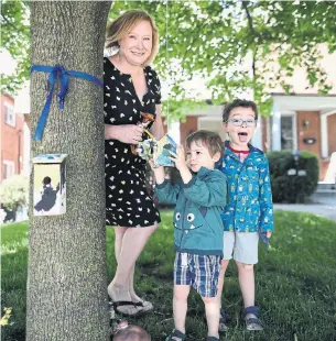  ?? RICHARD LAUTENS TORONTO STAR ?? Since taking a leave from her job amid the pandemic, Stephenie Summerhill has poured herself into making life livable for her family, including sons Oscar, 5, right, and Felix, 3.
