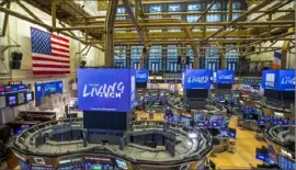  ?? Kearney Ferguson/NYSE via AP ?? This photo provided by the New York Stock Exchange shows the unoccupied NYSE trading floor, closed temporaril­y for the first time in 228 years as a result of coronaviru­s concerns.