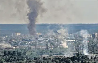  ?? AFP ?? Smoke and dirt rise from the city of Severodone­tsk during fighting in the eastern Ukrainian region of Donbas.