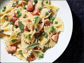  ?? For The Washington Post/STACY ZARIN GOLDBERG ?? Farfalle With Salmon, Peas and Sage